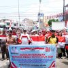 Pupuk Nasionalisme, Pemkab Tapanuli Utara Bagikan 1.814 Bendera Merah Putih di Siborong-borong